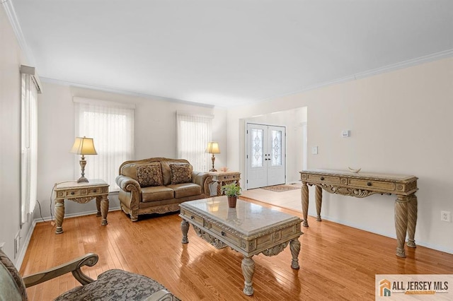 3 Eric Ct, Monroe, NJ 08831 - living room featuring ornamental molding, light wood-style flooring, and baseboards