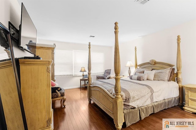 3 Eric Ct, Monroe, NJ 08831 - bedroom featuring dark wood-style floors and baseboards