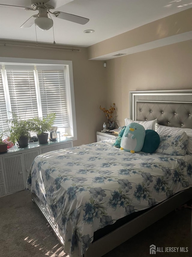 205 Water St, Perth Amboy, NJ 08861 - carpeted bedroom featuring a ceiling fan