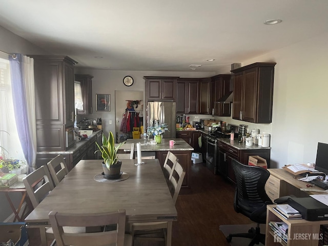 205 Water St, Perth Amboy, NJ 08861 - dining room featuring a desk and dark wood-style flooring