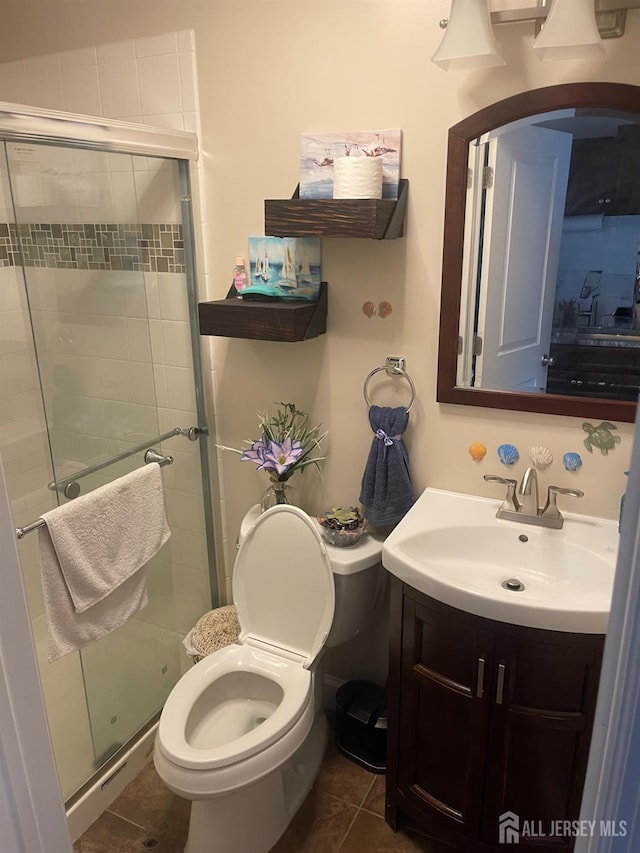 205 Water St, Perth Amboy, NJ 08861 - bathroom with vanity, a stall shower, and tile patterned floors