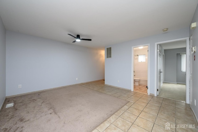 270 Main St Unit 6, Keansburg, NJ 07734 - unfurnished room with a ceiling fan, light tile patterned flooring, a smoke detector, and light carpet