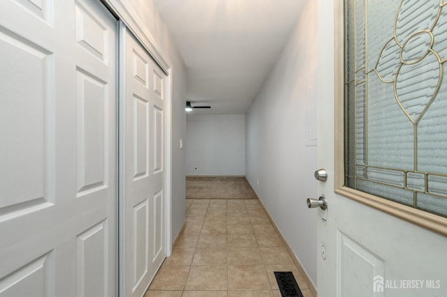 270 Main St Unit 6, Keansburg, NJ 07734 - hall with light tile patterned floors and baseboards