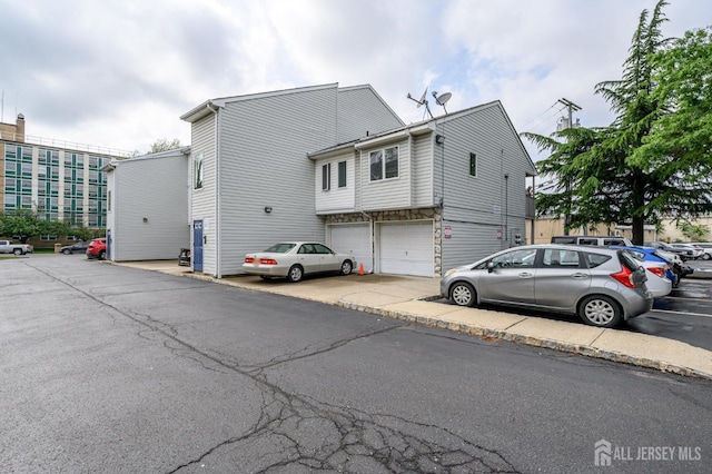 270 Main St Unit 6, Keansburg, NJ 07734 - view of front of property with a garage