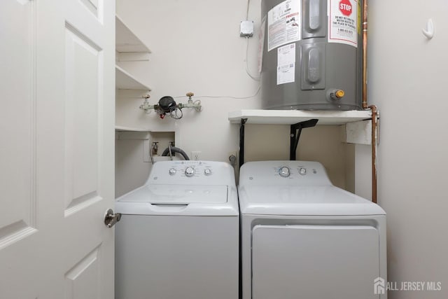 123-G Concordia Cir Unit G, Monroe, NJ 08831 - laundry room featuring water heater and separate washer and dryer