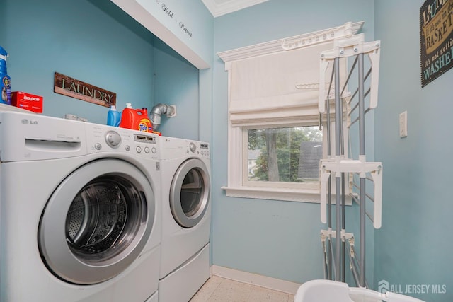 322 2nd St, Middlesex, NJ 08812 - laundry room with separate washer and dryer and crown molding