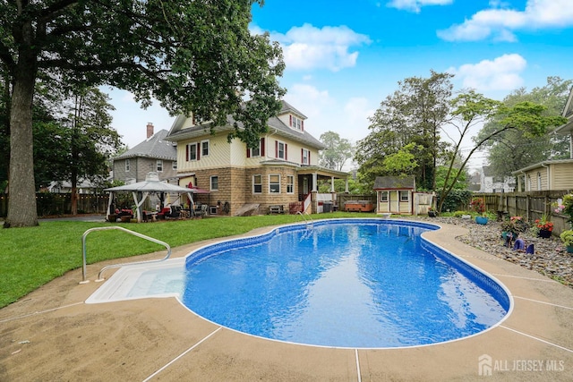 322 2nd St, Middlesex, NJ 08812 - view of swimming pool with a gazebo, a fenced backyard, a storage shed, and a patio