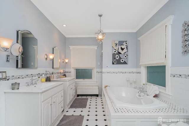 322 2nd St, Middlesex, NJ 08812 - bathroom with tile walls, vanity, a garden tub, wainscoting, and a chandelier