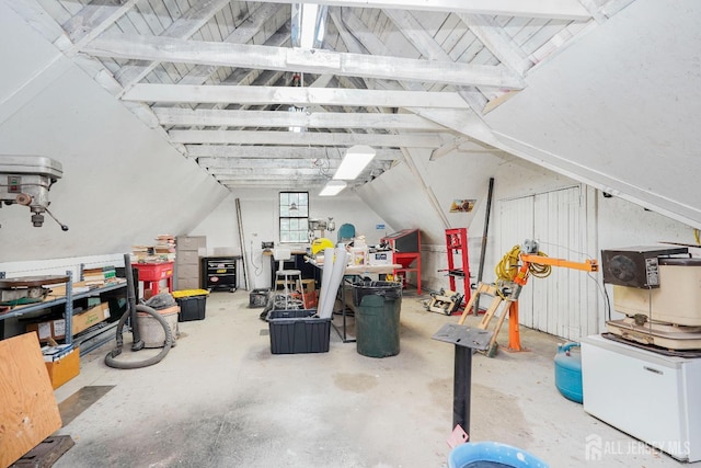 322 2nd St, Middlesex, NJ 08812 - garage with a workshop area and refrigerator