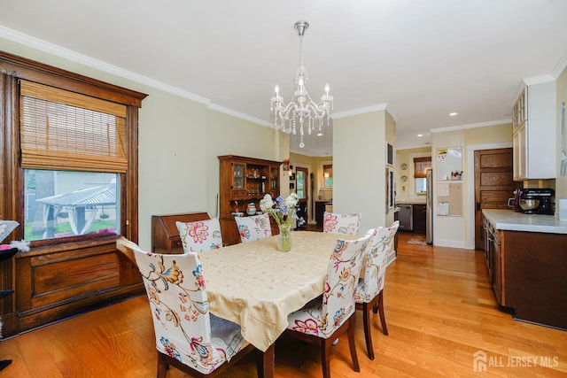 322 2nd St, Middlesex, NJ 08812 - dining room featuring a chandelier, light wood finished floors, crown molding, and recessed lighting