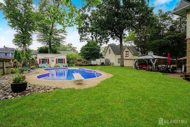 322 2nd St, Middlesex, NJ 08812 - view of swimming pool featuring a gazebo, an outbuilding, a fenced backyard, and a patio area