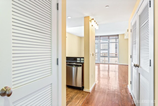 20 Livingston Ave Unit 902, New Brunswick, NJ 08901 - hall with wood-type flooring and baseboards