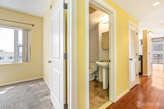 20 Livingston Ave Unit 902, New Brunswick, NJ 08901 - hallway with baseboards and recessed lighting