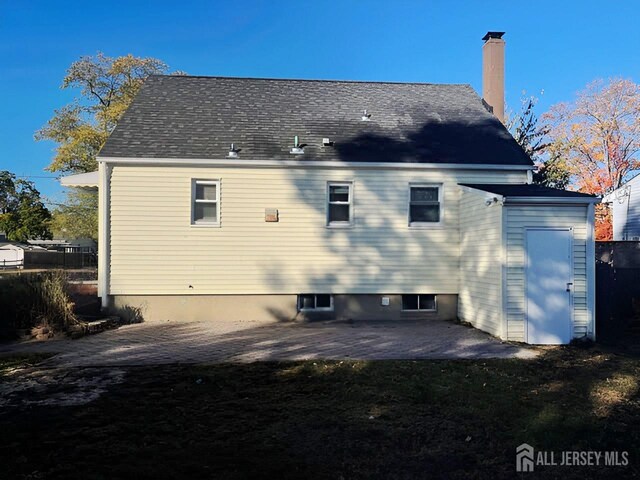 back of house featuring a patio area