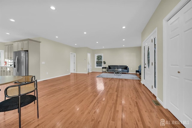 176 Easy St, Edison, NJ 08817 - unfurnished living room featuring light wood-style floors, baseboards, and recessed lighting