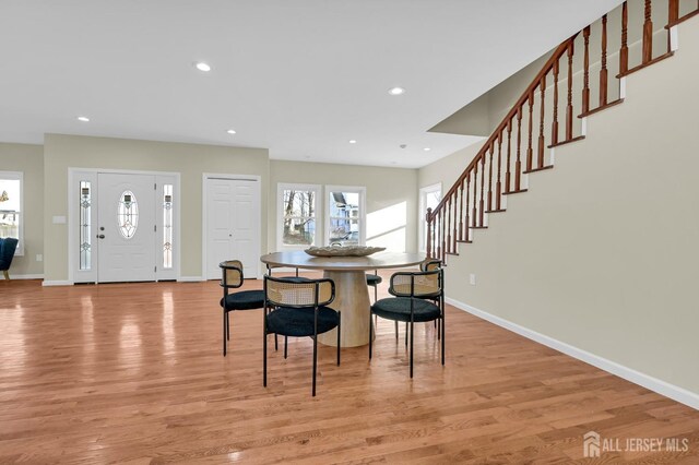176 Easy St, Edison, NJ 08817 - dining area with baseboards, light wood-type flooring, stairway, and recessed lighting