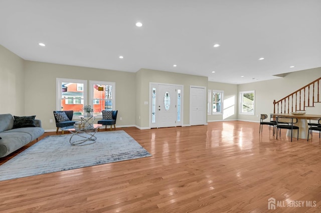 176 Easy St, Edison, NJ 08817 - living room with light wood-style floors, stairway, baseboards, and recessed lighting