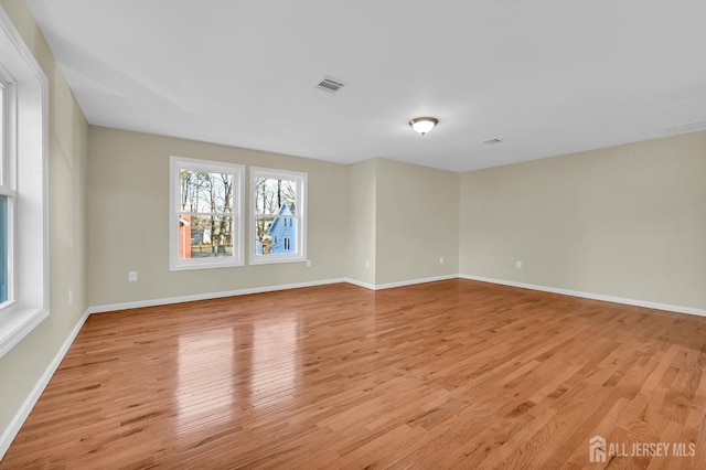 176 Easy St, Edison, NJ 08817 - empty room with light wood-style floors and baseboards