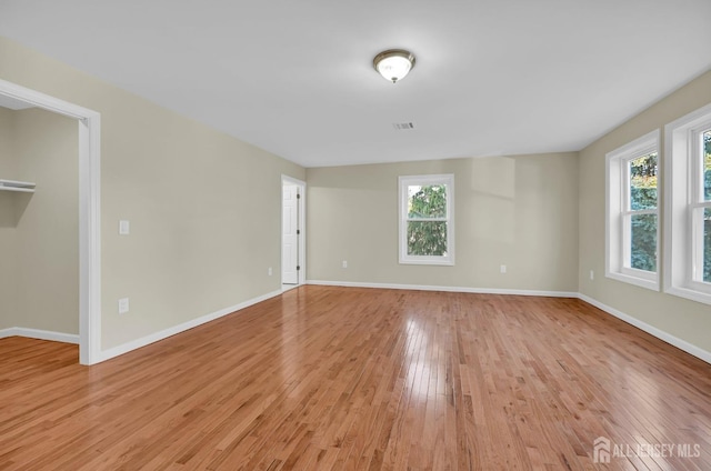 176 Easy St, Edison, NJ 08817 - unfurnished room featuring plenty of natural light, light wood-style floors, and baseboards