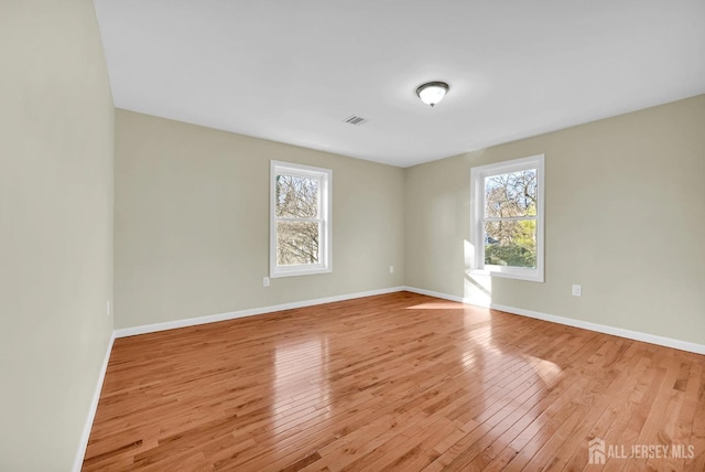 176 Easy St, Edison, NJ 08817 - empty room with wood-type flooring and baseboards