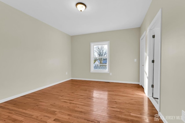 176 Easy St, Edison, NJ 08817 - spare room with light wood-type flooring and baseboards