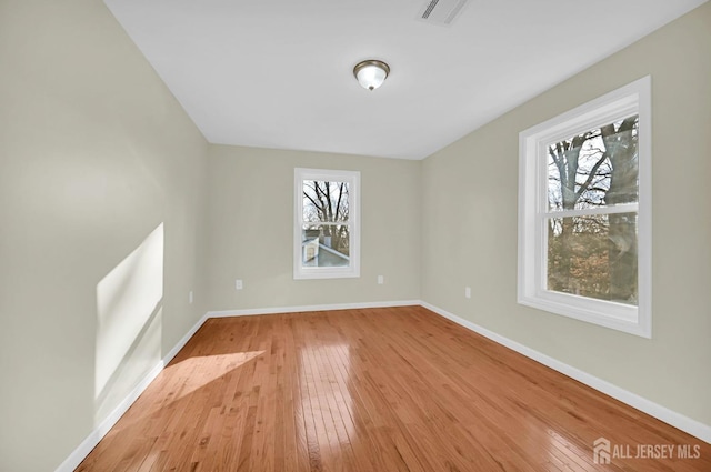 176 Easy St, Edison, NJ 08817 - empty room with light wood-type flooring and baseboards