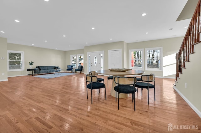 176 Easy St, Edison, NJ 08817 - dining area featuring light wood finished floors, stairway, recessed lighting, and baseboards