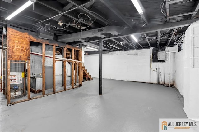 99 Crestview Rd, Fords, NJ 08863 - unfinished below grade area featuring stairway, gas water heater, and electric panel