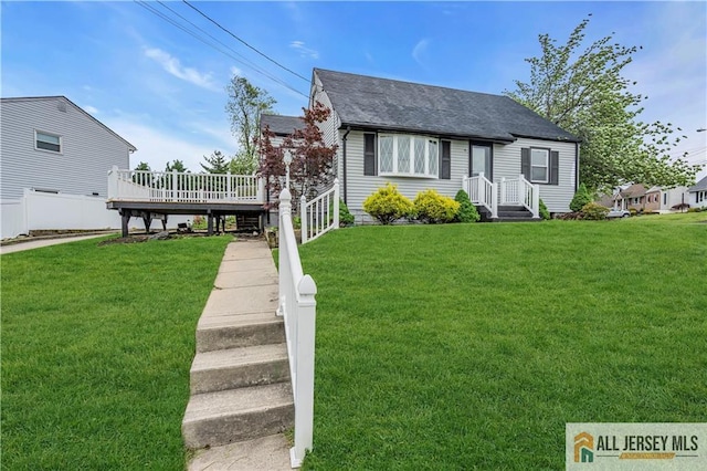 99 Crestview Rd, Fords, NJ 08863 - view of front of house featuring a front yard, a wooden deck, and roof with shingles