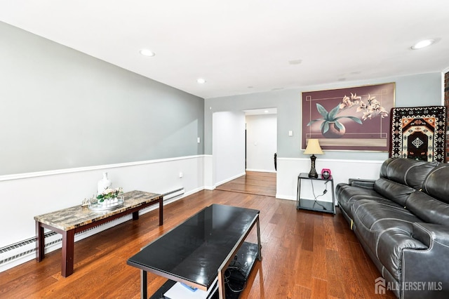 16 Kerschner Ln, East Brunswick, NJ 08816 - living area with a baseboard heating unit, wood finished floors, and recessed lighting
