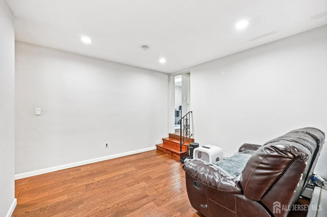 16 Kerschner Ln, East Brunswick, NJ 08816 - sitting room with wood finished floors, recessed lighting, and stairway