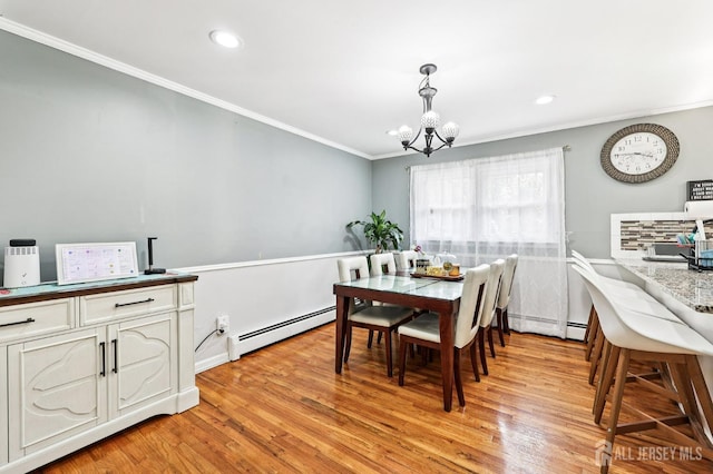 16 Kerschner Ln, East Brunswick, NJ 08816 - dining room with baseboard heating, a chandelier, crown molding, light wood finished floors, and recessed lighting