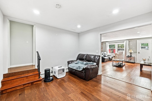 16 Kerschner Ln, East Brunswick, NJ 08816 - living room featuring wood finished floors, recessed lighting, stairway, and a baseboard radiator