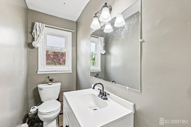 16 Kerschner Ln, East Brunswick, NJ 08816 - half bath with vanity and a chandelier