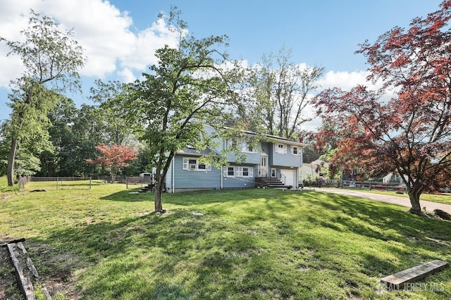 16 Kerschner Ln, East Brunswick, NJ 08816 - view of yard with a garage, driveway, and entry steps