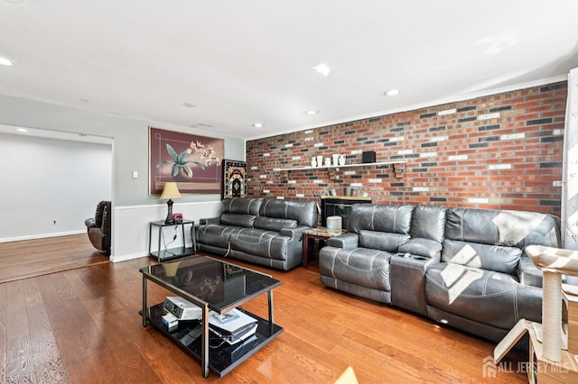 16 Kerschner Ln, East Brunswick, NJ 08816 - living area with hardwood / wood-style floors, brick wall, and recessed lighting