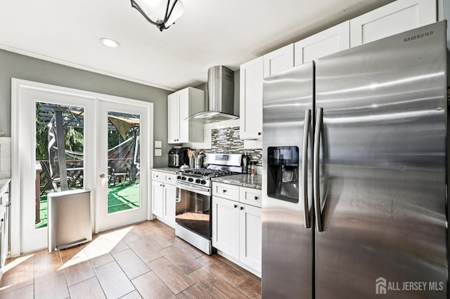 16 Kerschner Ln, East Brunswick, NJ 08816 - kitchen featuring appliances with stainless steel finishes, wall chimney range hood, light stone countertops, white cabinets, and recessed lighting