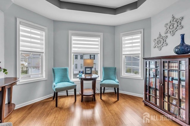 904 4th St, Union Beach, NJ 07735 - sitting room featuring baseboards, a wealth of natural light, and wood finished floors