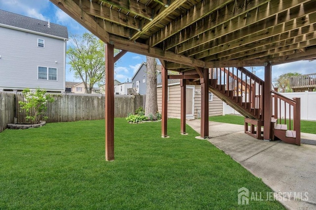 904 4th St, Union Beach, NJ 07735 - view of yard with stairs, a patio, and a fenced backyard
