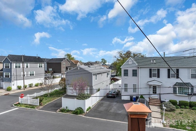 904 4th St, Union Beach, NJ 07735 - view of street with traffic signs and a residential view