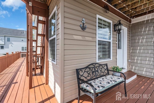 904 4th St, Union Beach, NJ 07735 - wooden deck featuring a porch