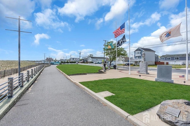 904 4th St, Union Beach, NJ 07735 - view of home's community with a yard and fence