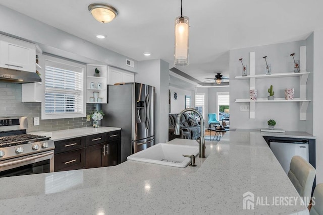 904 4th St, Union Beach, NJ 07735 - kitchen featuring a sink, stainless steel appliances, open shelves, under cabinet range hood, and ceiling fan