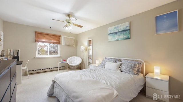 carpeted bedroom featuring ceiling fan, a wall unit AC, and a baseboard heating unit