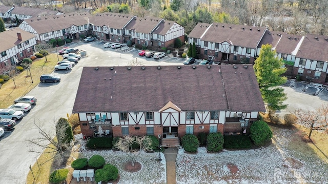 birds eye view of property with a residential view