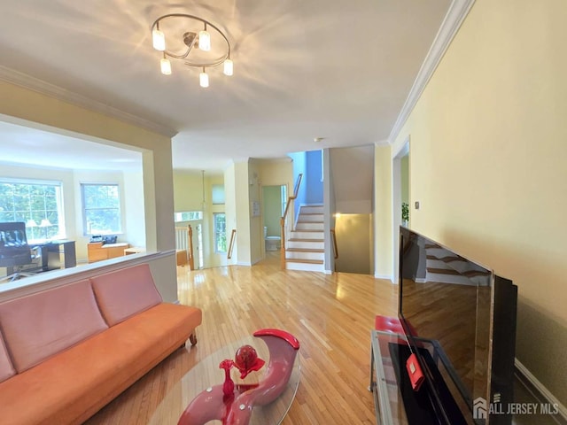 3 Great Beds Way S, Amboy, NJ 08879 - living room with crown molding, wood finished floors, stairs, and baseboards