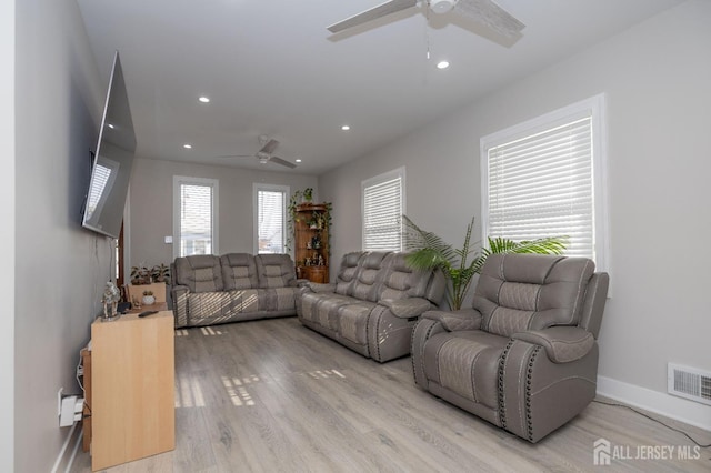 118 Holly St, Port Reading, NJ 07064 - living area with ceiling fan, light wood finished floors, recessed lighting, and baseboards