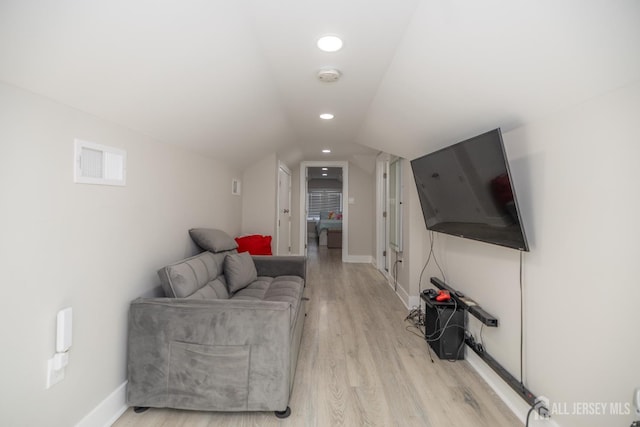 118 Holly St, Port Reading, NJ 07064 - living area with light wood-type flooring, lofted ceiling, baseboards, and recessed lighting