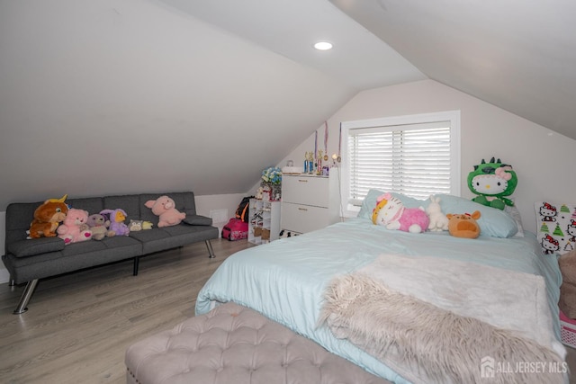 118 Holly St, Port Reading, NJ 07064 - bedroom with wood finished floors and vaulted ceiling