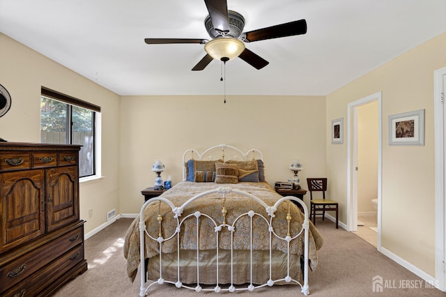 29 Whittney Ct, East Brunswick, NJ 08816 - carpeted bedroom featuring connected bathroom and a ceiling fan